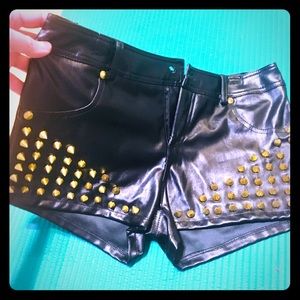 Studded black pleather shorts